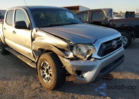 2014 Toyota Tacoma Base V6 z USA, uszkodzony, nr VIN 3TMLU4EN1EM144853